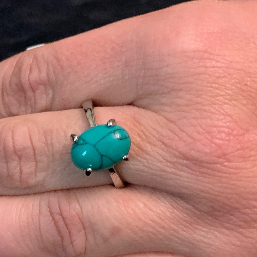 Green turquoise look oval stone